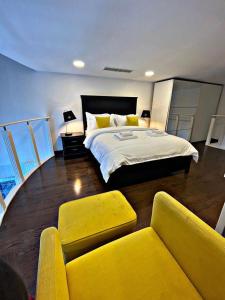 Voodi või voodid majutusasutuse Stunning Duplex Studio in JLT toas