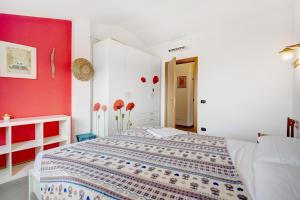 Katil atau katil-katil dalam bilik di Villa Ciò