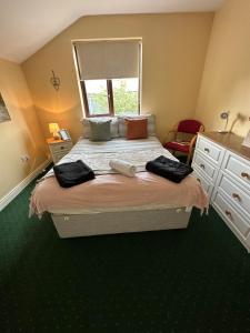 Postel nebo postele na pokoji v ubytování Edwards Cosy B&B