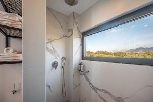 A bathroom at Aida Luxury Villas