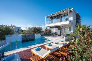 The swimming pool at or close to Aida Luxury Villas
