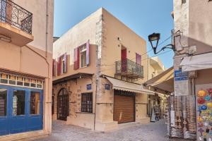 a group of buildings on a street at Filomeli Estate in Chania Town