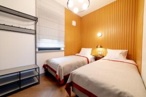 Postel nebo postele na pokoji v ubytování Hotel Gothards