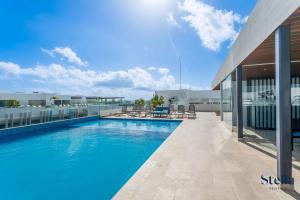 Бассейн в Ipana Condo, Rooftop Pools, Gym, Walk to Beach или поблизости