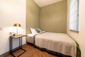 Postel nebo postele na pokoji v ubytování Hotel Gothards