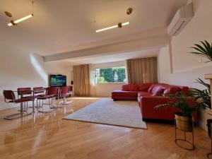 TV a/nebo společenská místnost v ubytování Guest House Laura