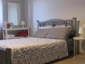 A bed or beds in a room at Il Rifugio dei Briganti