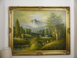 a picture of a painting of a mountain at Casa Marzia in Montevarchi