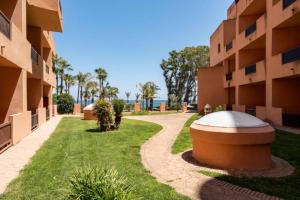 Zahrada ubytování CT 240 - Beachfront Apartment -Don Juan Manilva