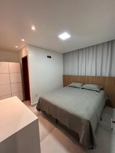 a bedroom with a bed in a room at Casa 600 Campina Grande in Campina Grande