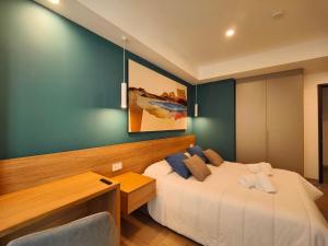 Postel nebo postele na pokoji v ubytování Carducci Art Guesthouse