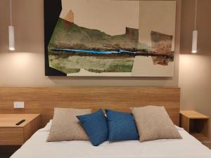 Postel nebo postele na pokoji v ubytování Carducci Art Guesthouse