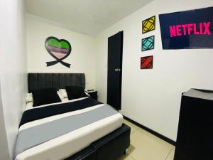 Krevet ili kreveti u jedinici u okviru objekta Hotel Bogota Home