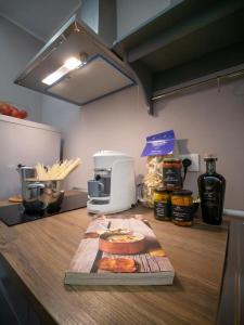 Kuchyň nebo kuchyňský kout v ubytování Locanda dei Sette Limoni - camere e residence