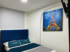 Krevet ili kreveti u jedinici u okviru objekta Hotel Bogota Home