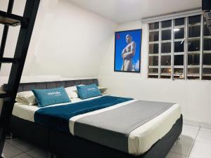 Krevet ili kreveti u jedinici u okviru objekta Hotel Bogota Home