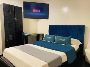 Krevet ili kreveti u jedinici u okviru objekta Hotel Bogota Home