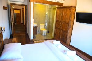Katil atau katil-katil dalam bilik di Anhel Hotel