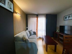 TV a/nebo společenská místnost v ubytování Naturaleza En Soldeu - Disfruta En Familia De Terraza Con Vistas - Parking Gratis