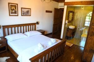 Katil atau katil-katil dalam bilik di Anhel Hotel