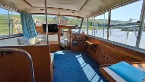 a view of the inside of a boat at The Rose - 37ft Lakeside Yacht with Hot Tub in Swansea