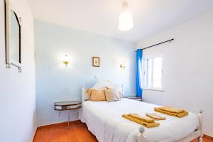 En eller flere senger på et rom på Quinta das Varandas by Umbral