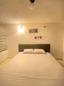 Cama o camas de una habitación en Apartamento amoblado en Pinares