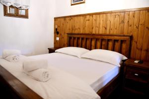 Katil atau katil-katil dalam bilik di Anhel Hotel