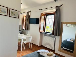 Letto o letti in una camera di Casa Mercurio