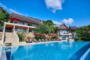 Bazén v ubytování Baan Jakawan nebo v jeho okolí