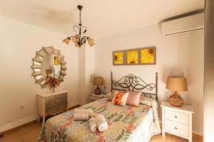 Een bed of bedden in een kamer bij El Patio Descubre la casa perfecta para tu grupo