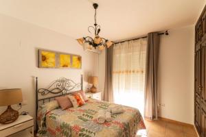 Ліжко або ліжка в номері El Patio Descubre la casa perfecta para tu grupo