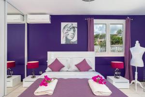 Giường trong phòng chung tại Villa Kaju +27 ảnh