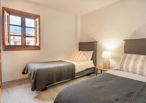 Posteľ alebo postele v izbe v ubytovaní 2 Penthouse Duquesa Marina Manilva Andalucia Spanien