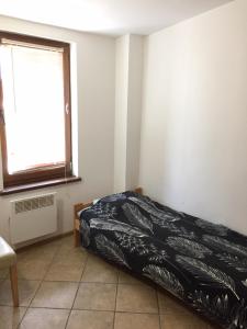 Postel nebo postele na pokoji v ubytování Kwatery Mamma Mia Opawska 1a
