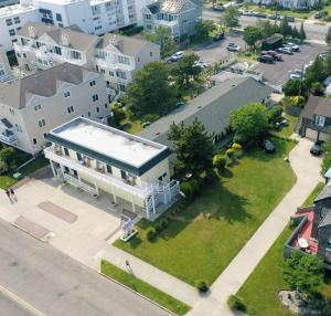an aerial view of a white house in a city at The Buckingham Motel in Cape May