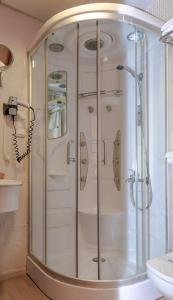 Koupelna v ubytování Hotel Tibur