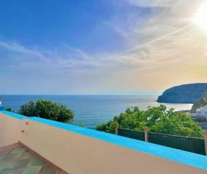 a view of the ocean from the balcony of a house at Casa Assunta in Ischia