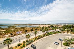 an aerial view of a road with palm trees at BeGuest Olhão Ria Formosa View in Olhão