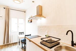 Cuisine ou kitchenette dans l'établissement Duplex Poizat - joli appartement - Villeurbanne