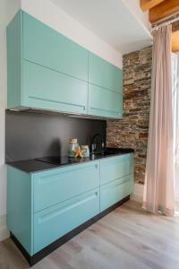 Kuchyňa alebo kuchynka v ubytovaní Apartamentos Turísticos Casa Arango
