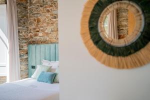 Posteľ alebo postele v izbe v ubytovaní Apartamentos Turísticos Casa Arango