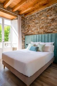 Posteľ alebo postele v izbe v ubytovaní Apartamentos Turísticos Casa Arango