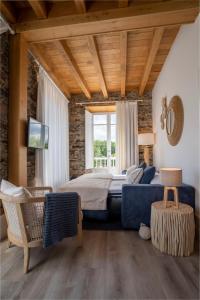 Posteľ alebo postele v izbe v ubytovaní Apartamentos Turísticos Casa Arango