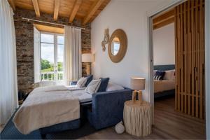 Posteľ alebo postele v izbe v ubytovaní Apartamentos Turísticos Casa Arango