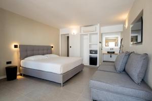 Llit o llits en una habitació de Lofos Village