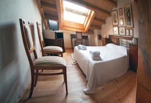 Postel nebo postele na pokoji v ubytování B&B La Valle dell'Albero