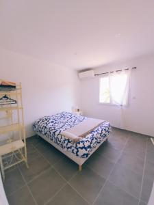 Postel nebo postele na pokoji v ubytování Gite Capparone 1