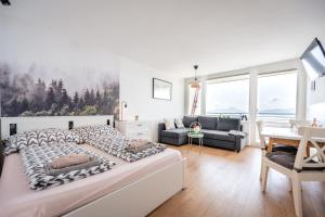 พื้นที่นั่งเล่นของ MOOKI Mountain & Pool Gerlitzen Apartment