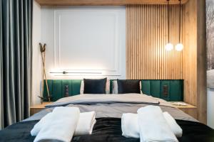 Posteľ alebo postele v izbe v ubytovaní Apartament Niebiańska Polana by Apart Concept Podhale